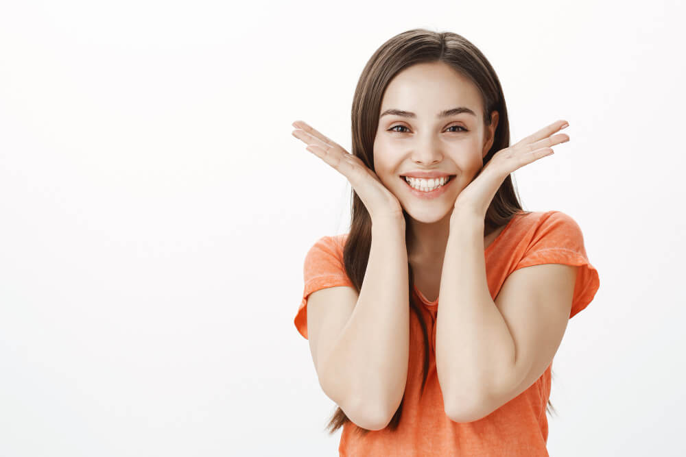 Cheerful girl with bright teeth