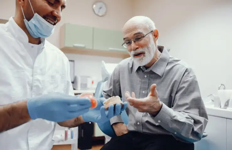 Full Dental Implants vs Dentures: Why Patients Are Switching in 2026